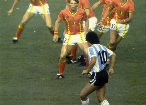Diego Maradona In Front Of A Bunch Of Belgium Players